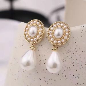 2/$15 Gold Tone Faux Pearl Drop Earrings